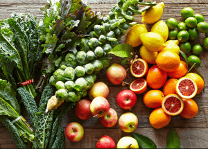 a group of fruits and vegetables on a wood surface Healthy Weight Loss Diets Marlborough